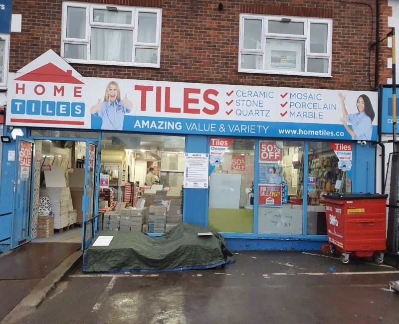 The front of a Home Tiles store, with it's signature red and blue colouration